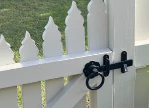 Front picket fence gate in white built by Gleeson Build